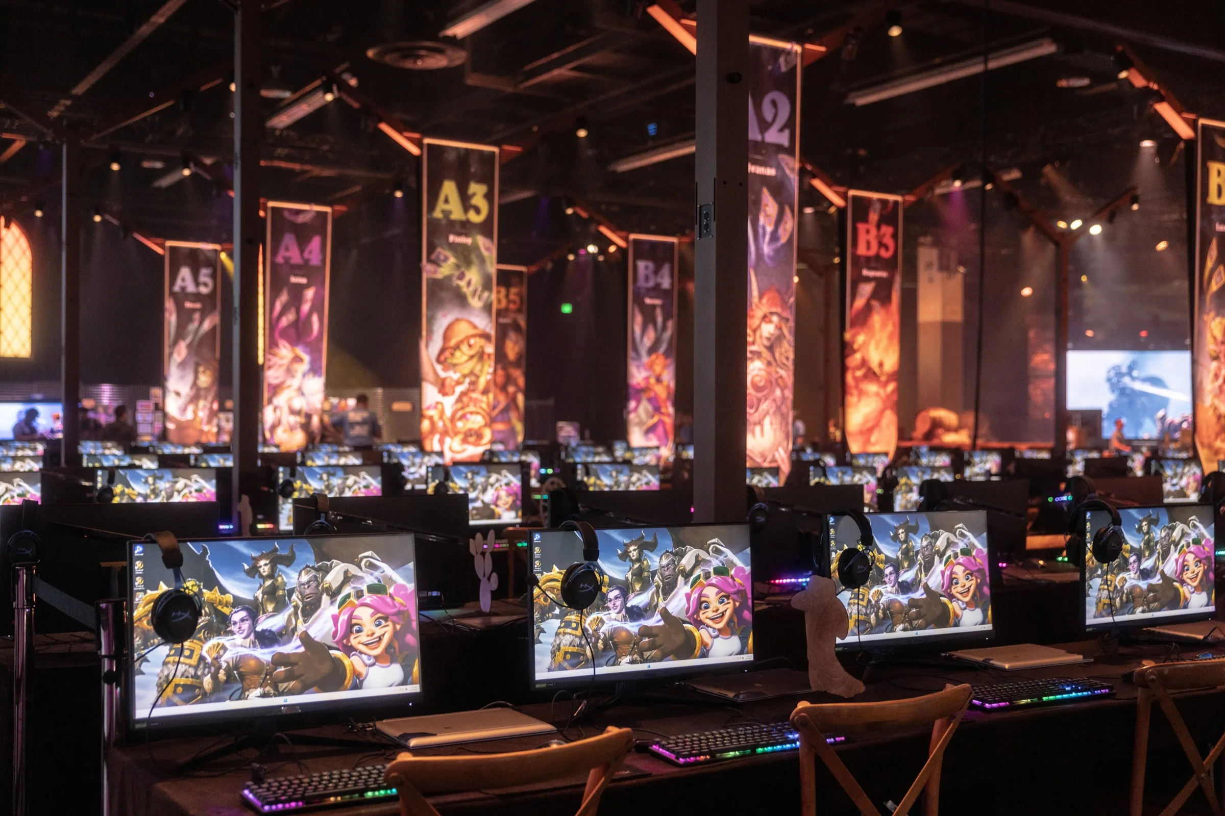 Hearthstone tournament area with printed player banners