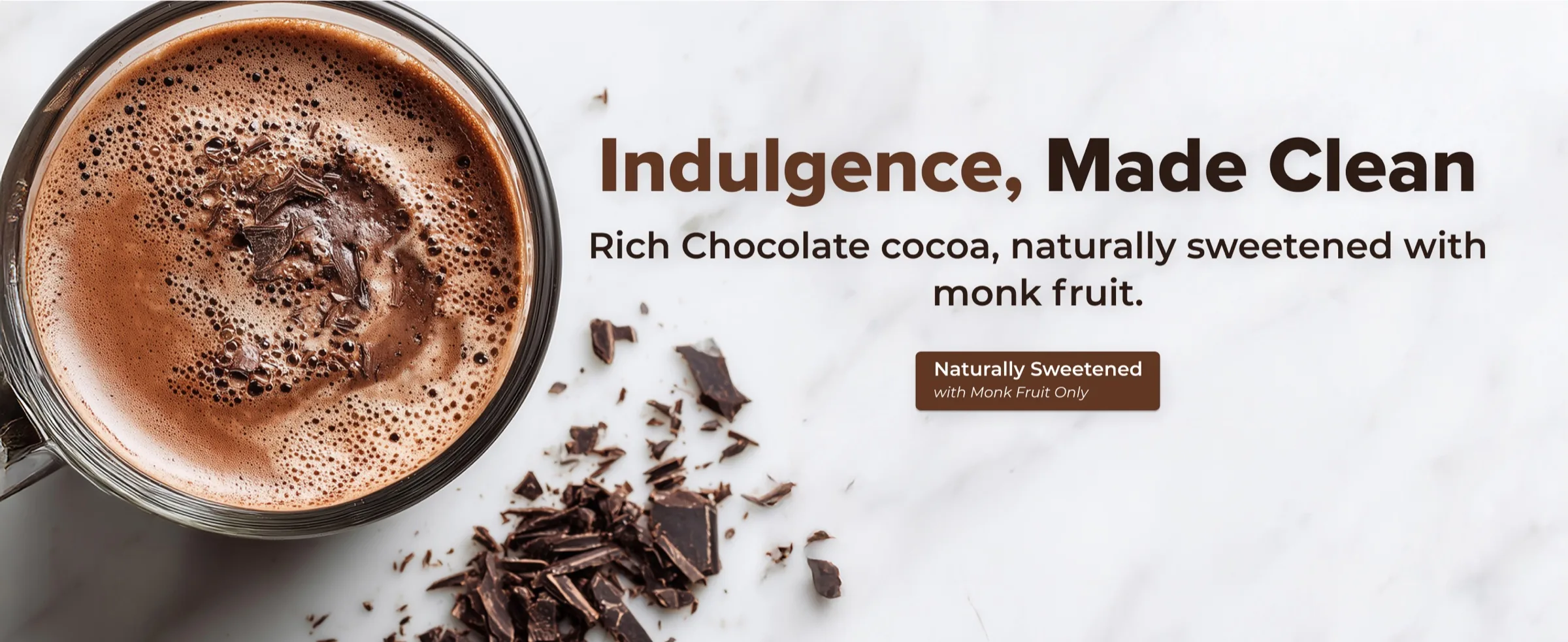 A+ banner: overhead mug of hot cocoa, indulgence made clean